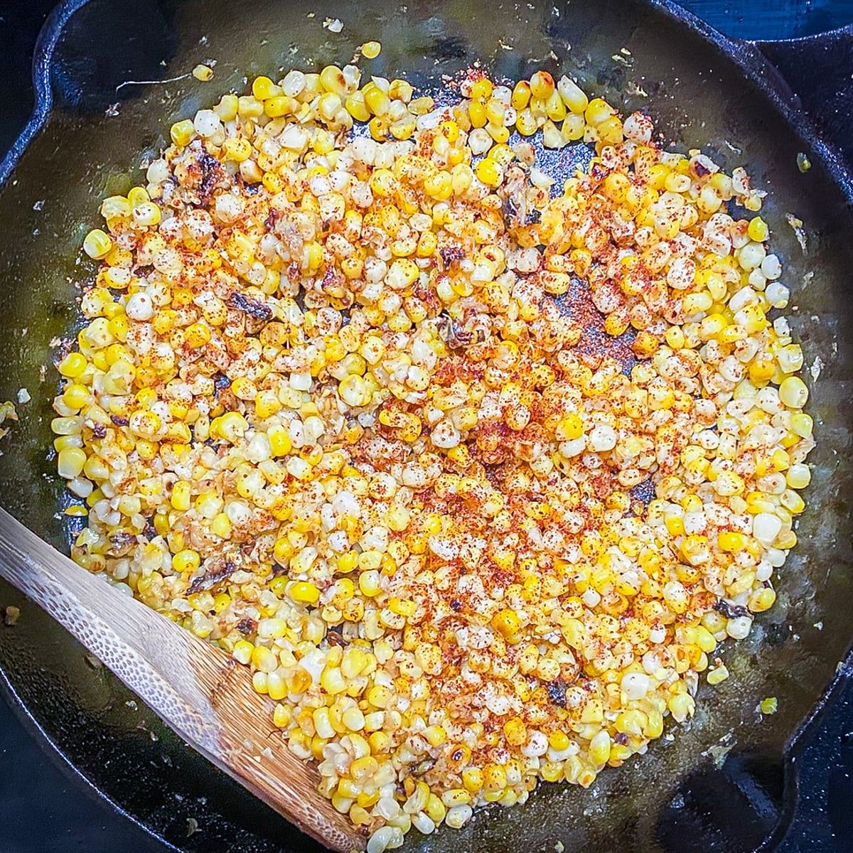 Step 3 - Add taj&iacute;n to the charred corn.