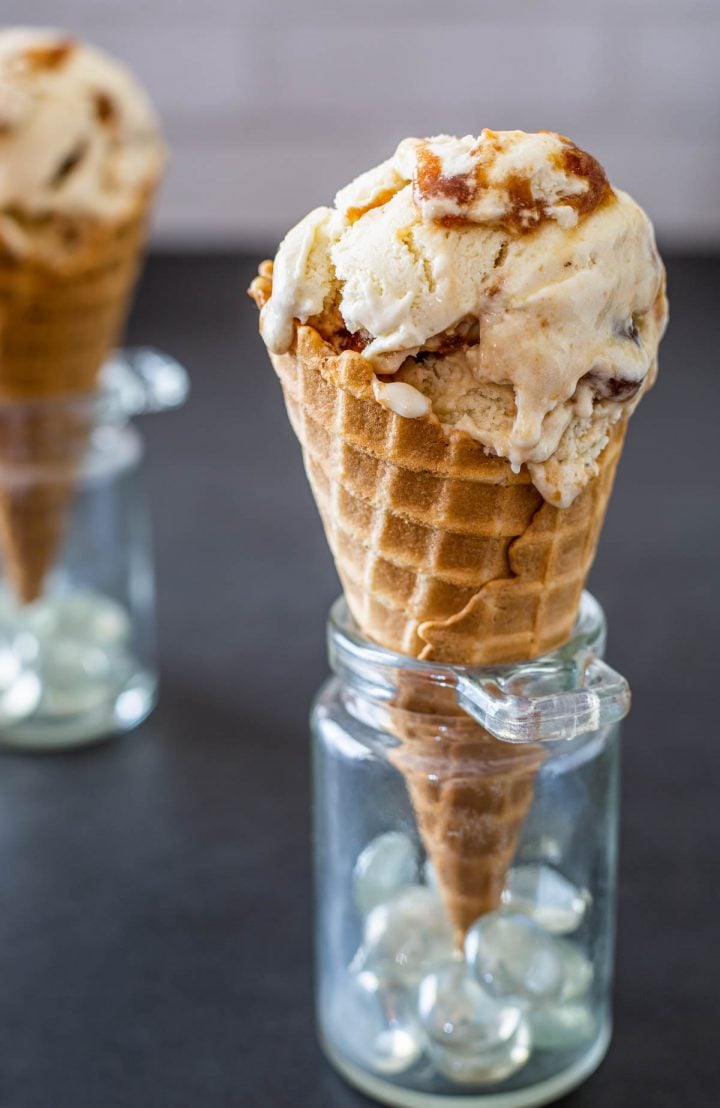 2 mason jars with coconut tamarind ice cream in waffle cones.