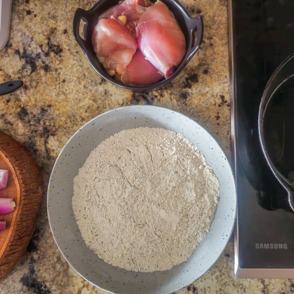 Step 1 - Dredge chicken in seasoned flour.