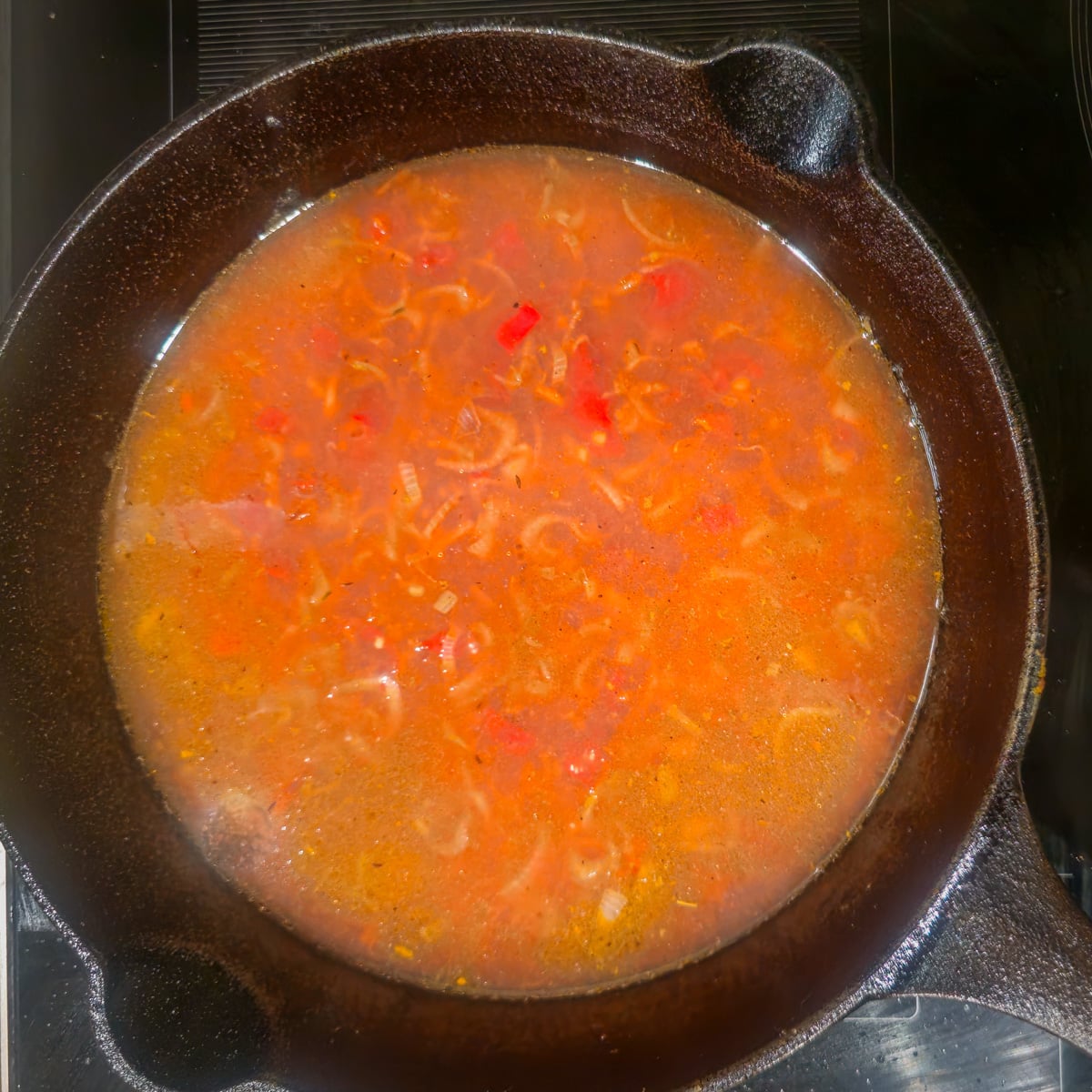 Step 4 - Cast iron skillet is de-glazed with dry sherry.