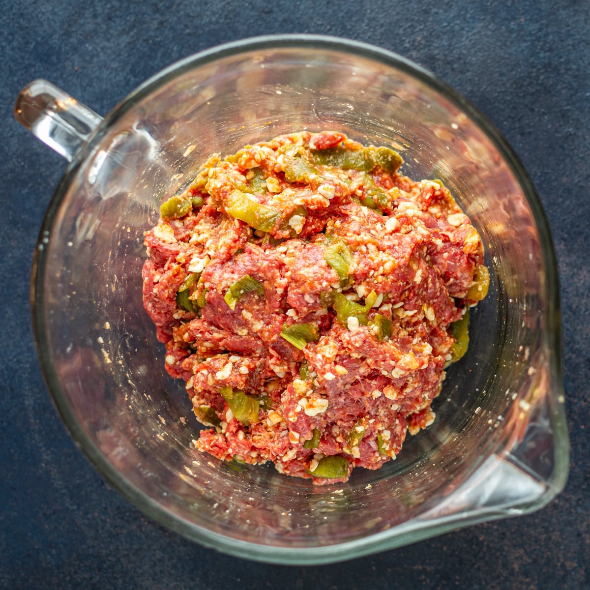 Step 2 - The patties are thoroughly combined in a glass bowl.