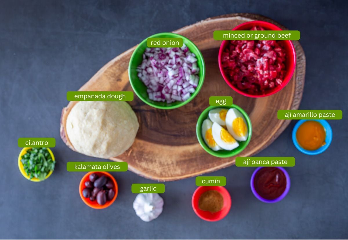 Ingredients for Peruvian empanadas including minced beef/bison, onion, and aj&iacute; pastes.