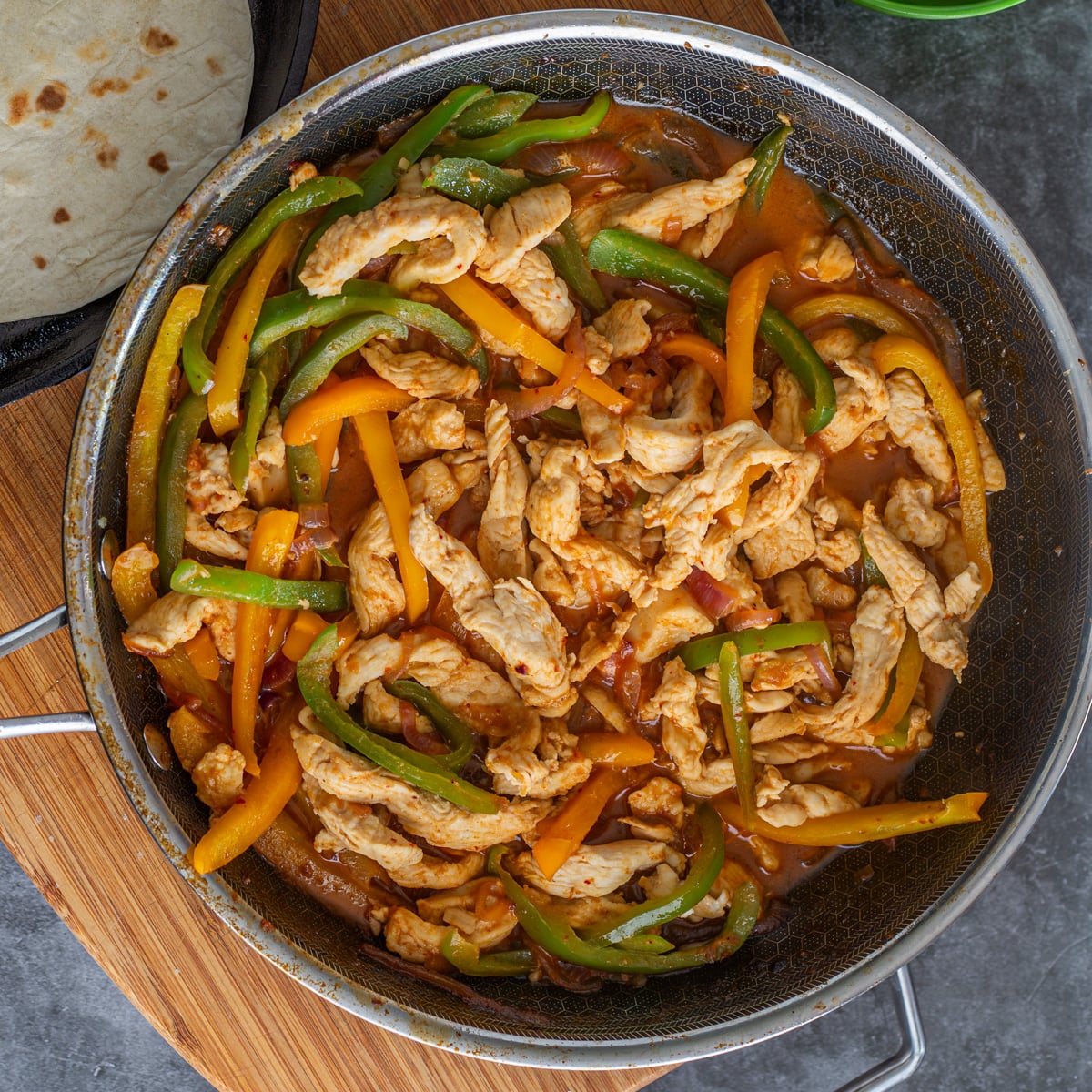 Step 5 - Add the chicken back into the saut&eacute; pan.