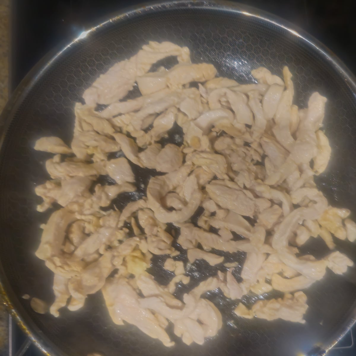 Step 1 - Brown the chicken in oil in a saut&eacute; pan.