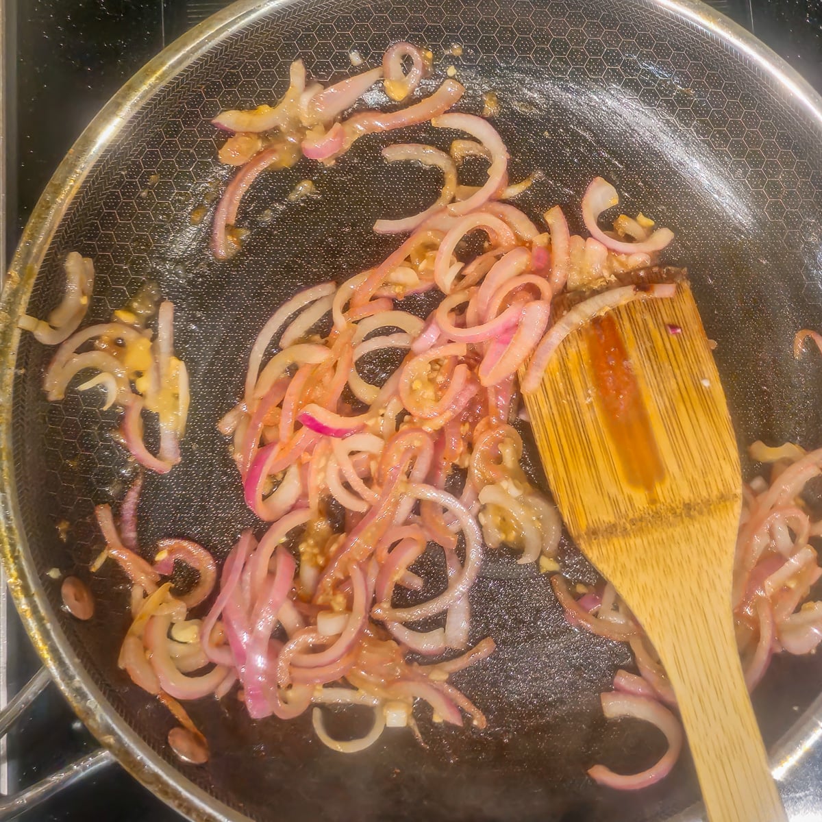 Step 2 - Saut&eacute; the onion, ginger, and garlic in a bit of vegetable and sesame oil.