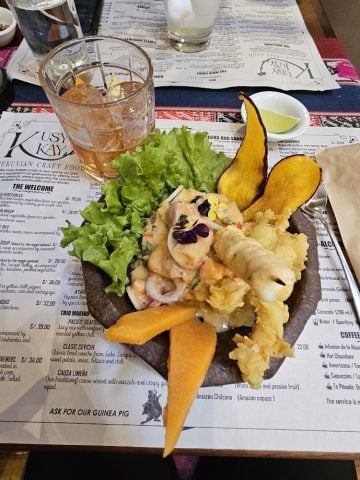 Fancy ceviche on news print.