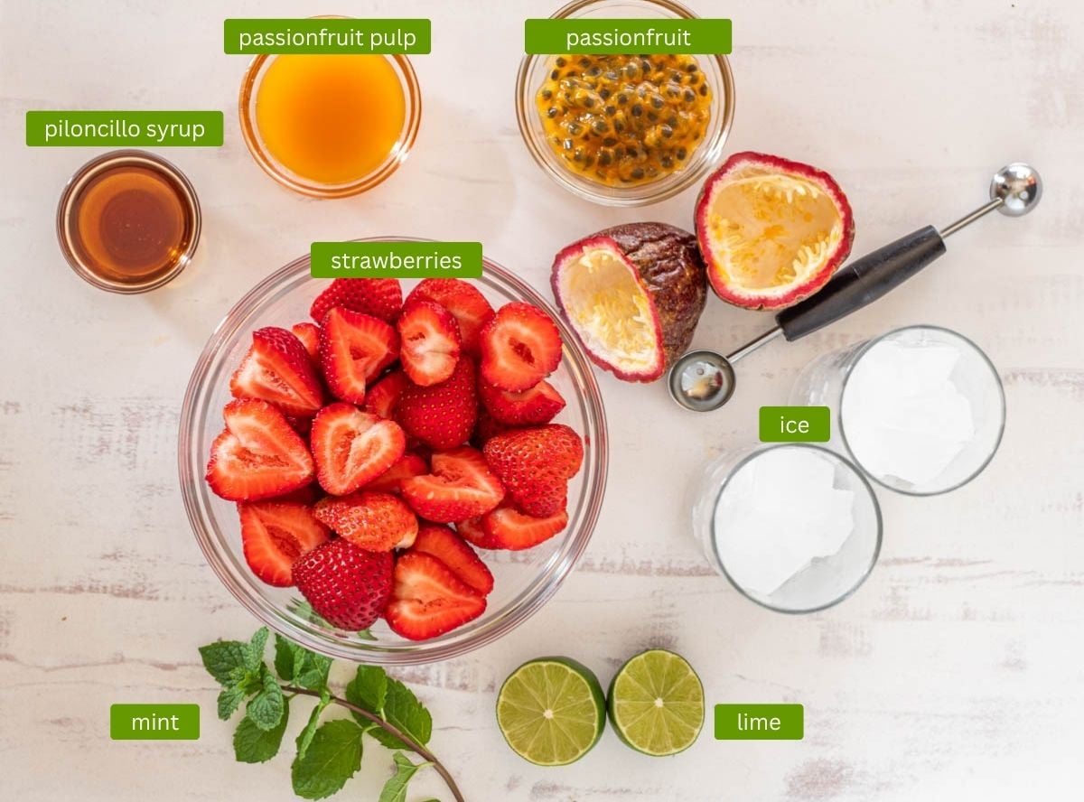 Ingredients for strawberry passionfruit agua frescas including strawberries and passionfruit.