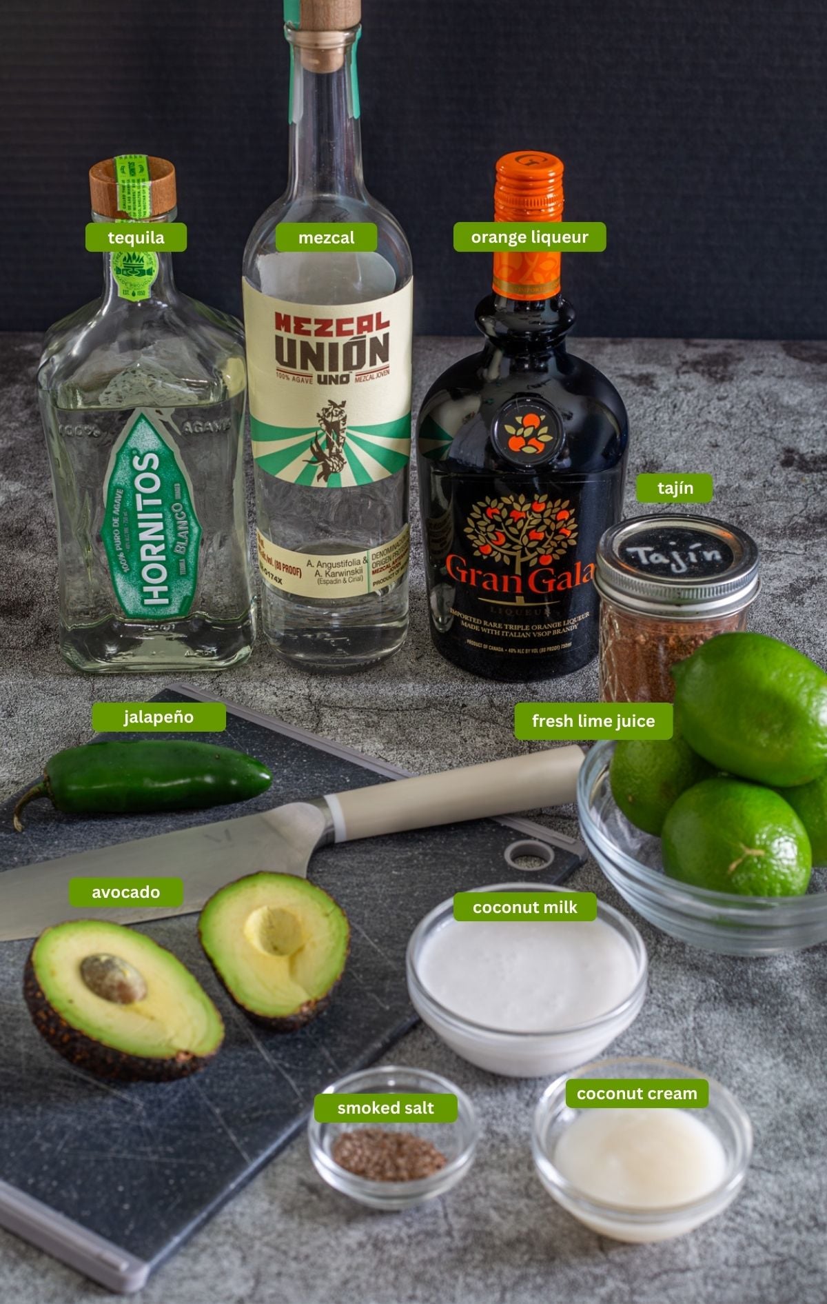 Ingredients for spicy smoky coconut avocado margaritas including mezcal and tequila.