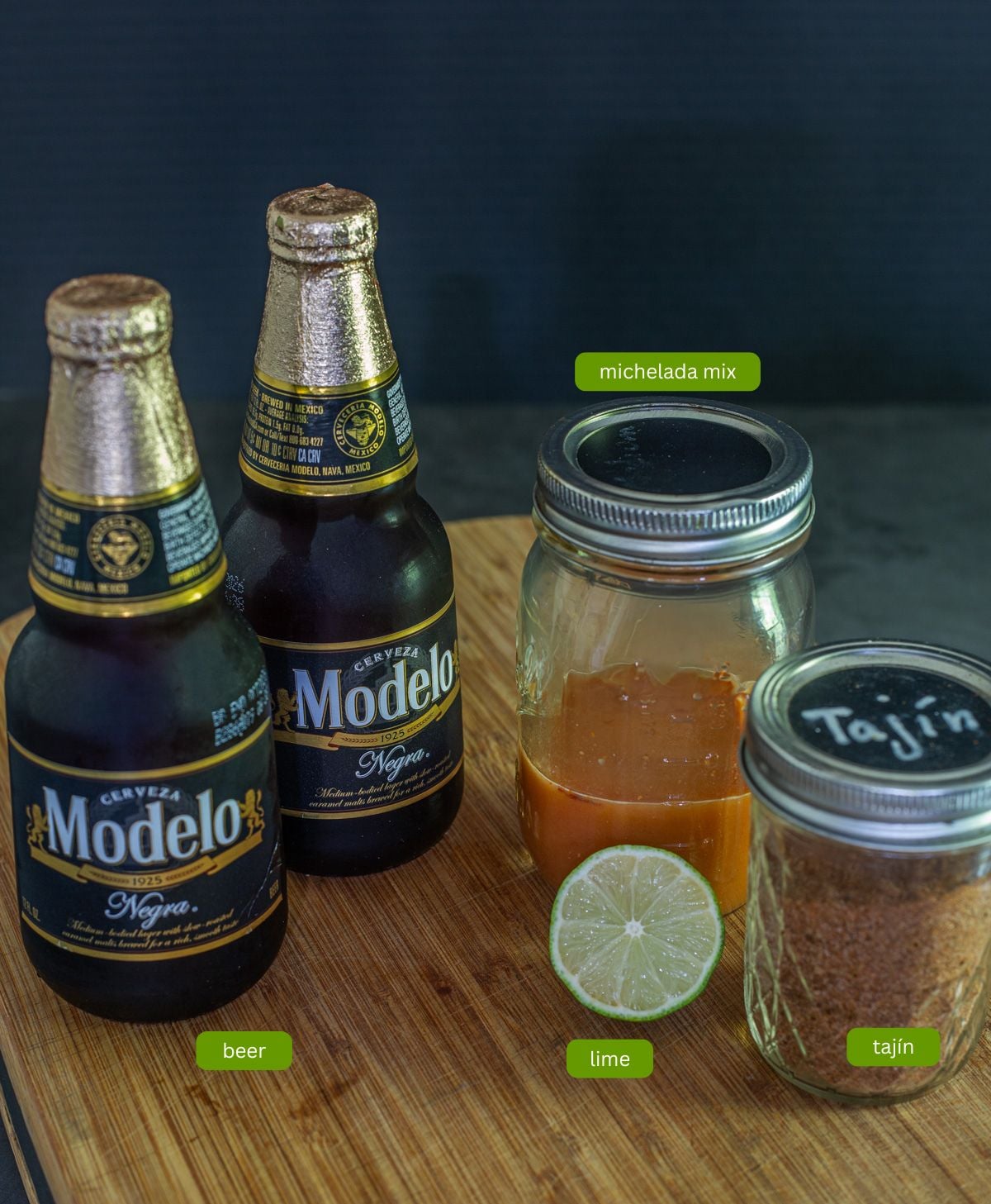 Ingredients for miso micheladas including Modelo Negra, michelada mix, and taj&iacute;n.