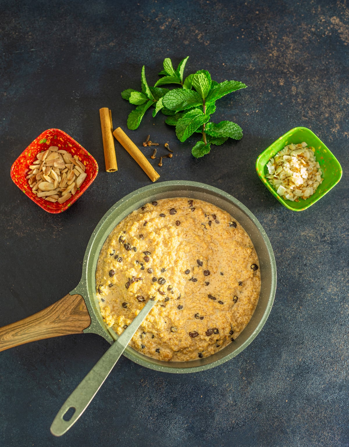 The milk mixture and the coconut mixture are combined in the medium saucepan. Currants or raisins are added while the mixture cools. Garnishes are prepared.