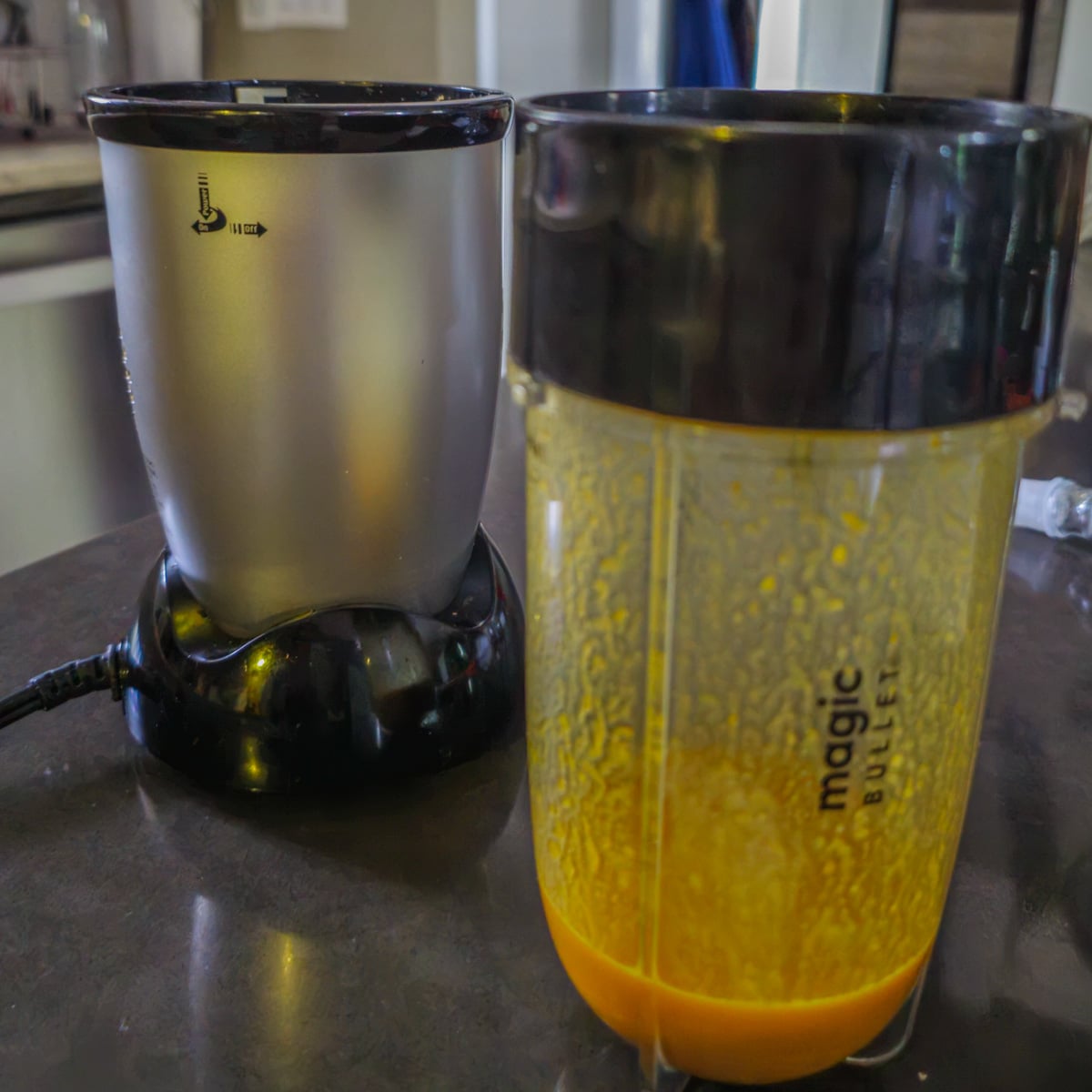 A personal blender with the ingredients for the tiradito sauce blended until smooth.