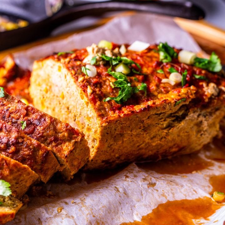 A close up of the sliced healthy Mexican meatloaf with its juices.