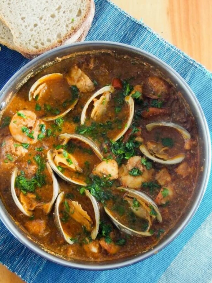 Catalan fish stew with clams and bread.