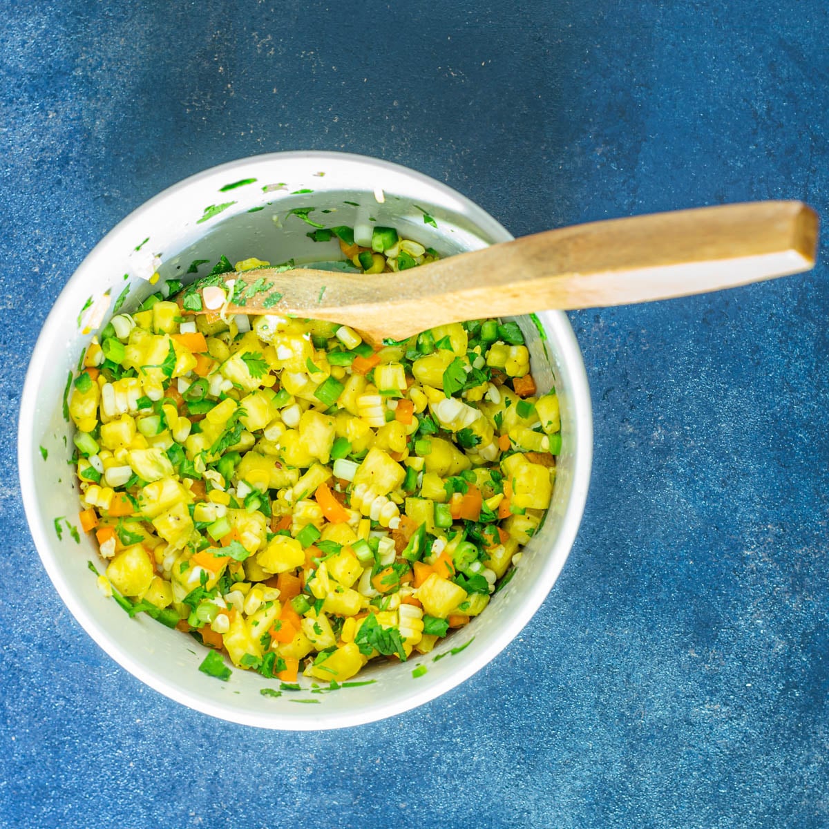 The ingredients for the salsa are combined with fresh lime juice.